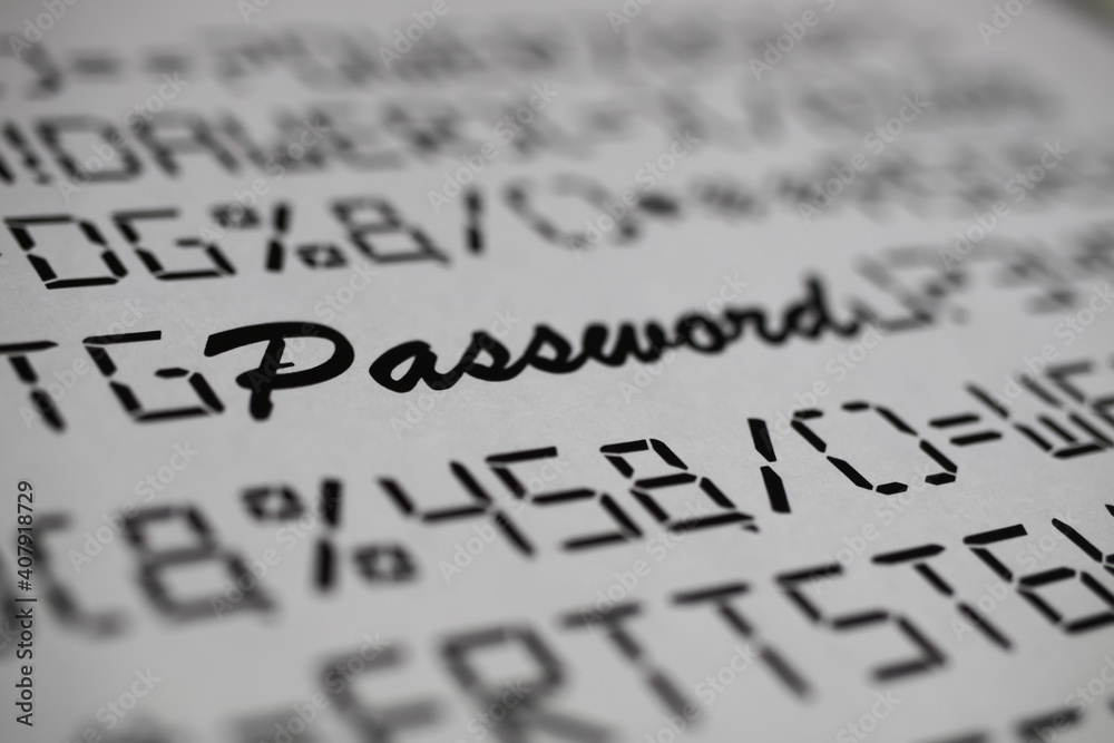 Close up of fictive letters and special characters with blurred word password, white background - complicated complex password change concept Close up of fictive letters and special characters with blurred word password, white background - complicated complex password change concept