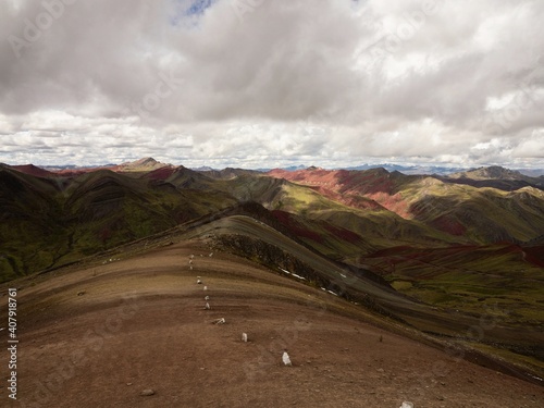 Panorama landscape view of Cordillera de Arcoiris colorful Palccoyo rainbow mountain Palcoyo Cuzco Peru South America photo