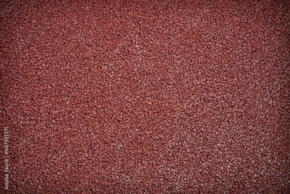 Close up Full Frame Shot in red runing track rubber texture Close up Full Frame Shot in red runing track rubber texture