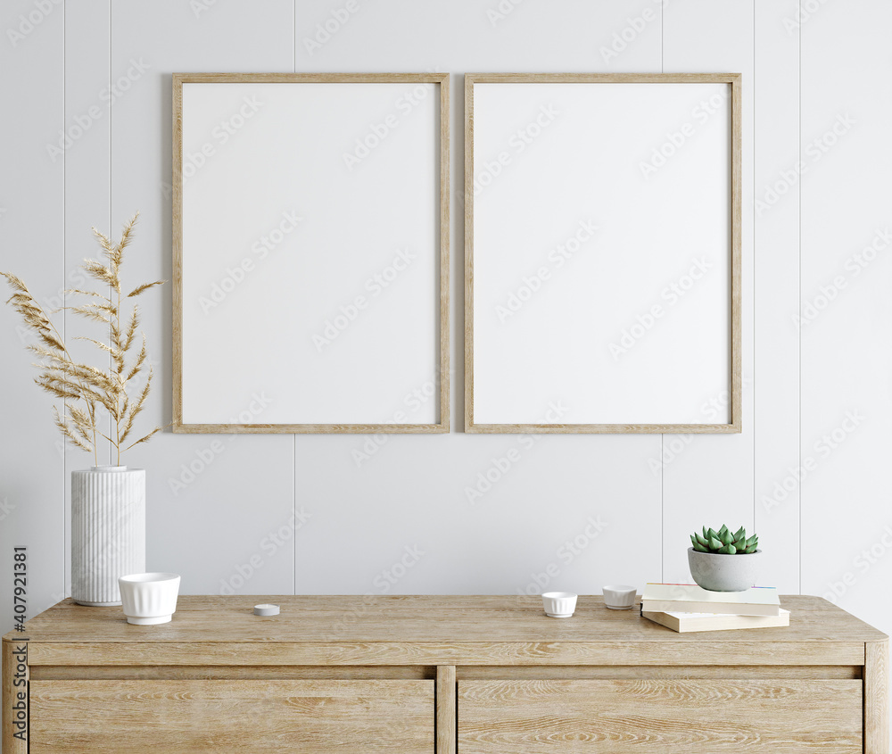 Fototapeta Mockup poster frame in modern interior with white wall and wooden console, home interior with plant, 3d rendering