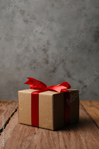 Flat lay of giftbox over wooden background, love and gift concept © Reza