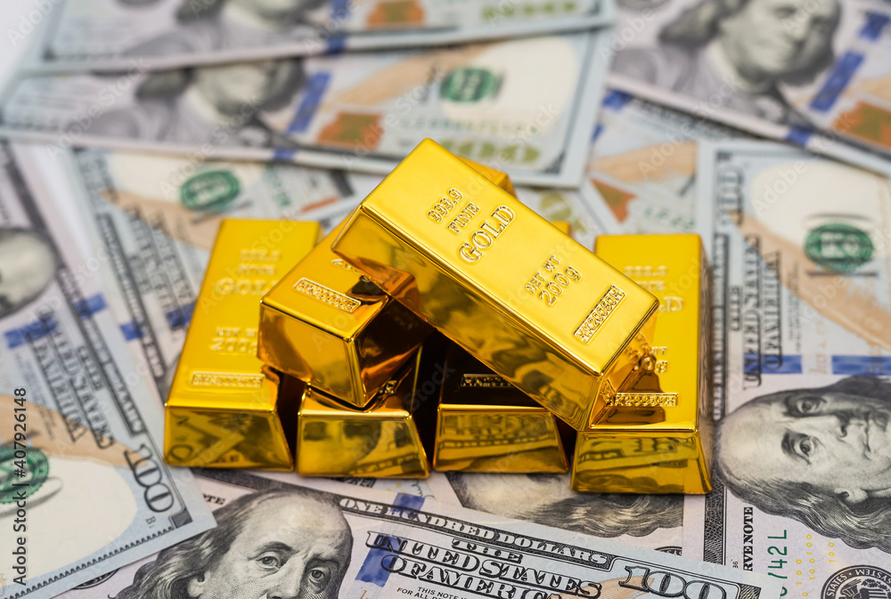gold bars on 100 new US dollar banknotes. gold bars on 100 new US dollar banknotes.