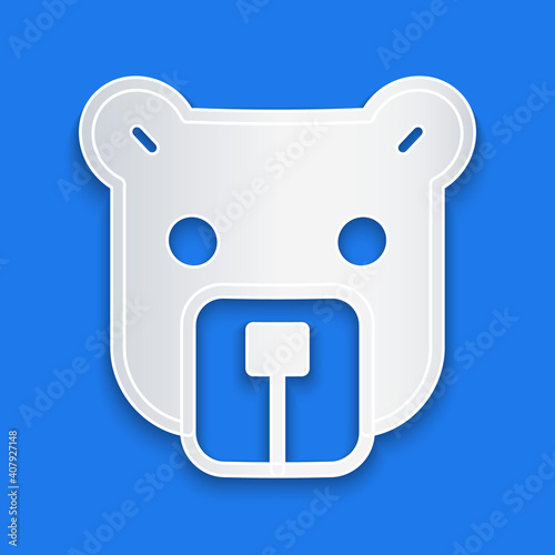Paper cut Bear head icon isolated on blue background. Paper art style. Vector.