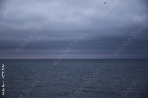 dark sky and sea in blue tones