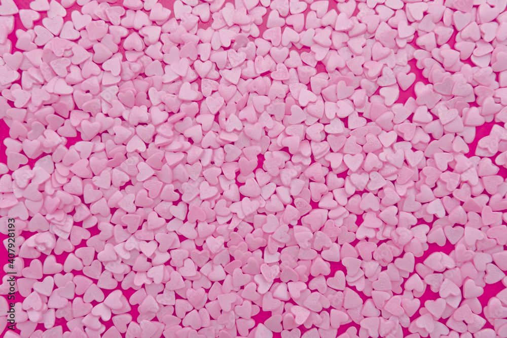 Small pink hearts texture background. Love and Happy Valentine's day theme Small pink hearts texture background. Love and Happy Valentine's day theme