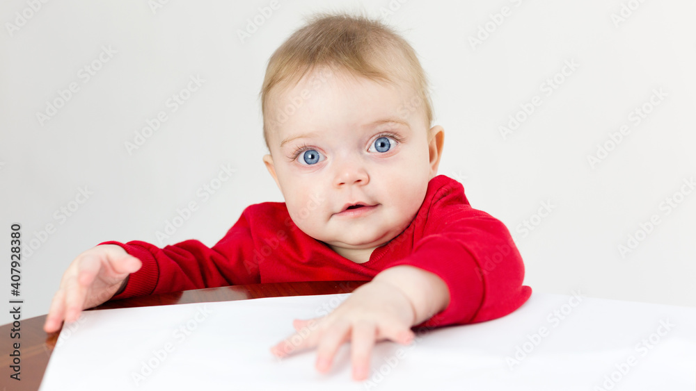 Little kid playing with blank sheets of paper Little kid playing with blank sheets of paper