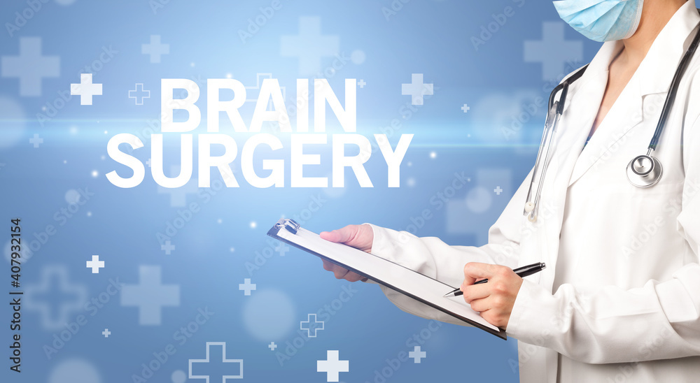 doctor writes notes on the clipboard with BRAIN SURGERY inscription, first aid concept doctor writes notes on the clipboard with BRAIN SURGERY inscription, first aid concept