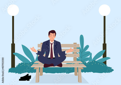Businessman doing yoga on a bench at the park