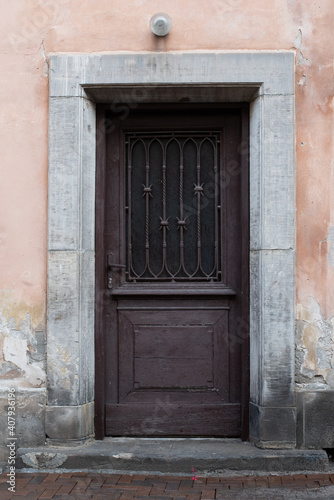 old wooden door in a wall © Алексей Лымарчук