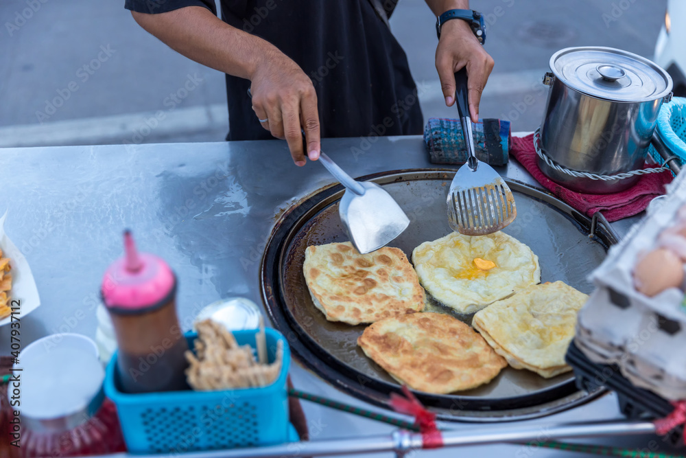 Roti Making, roti thresh flour by roti maker with oil. Indian ...
