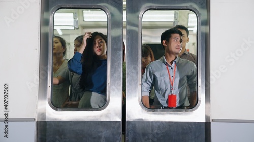 Canvastavla Crowd of people on a busy crowded public subway train travel