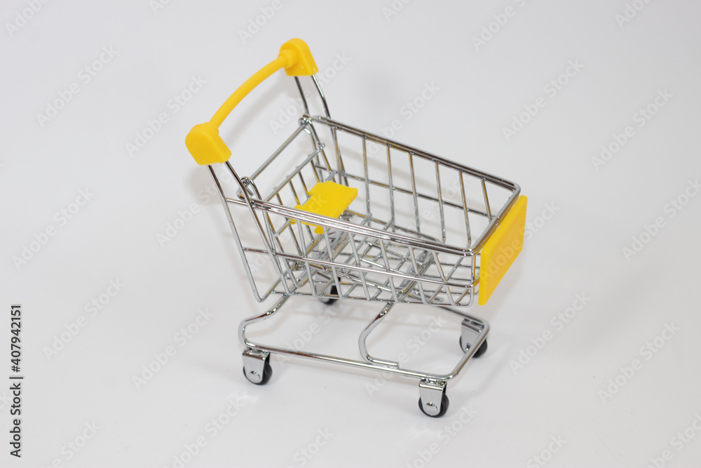 Yellow toy cart on white isolated background Yellow toy cart on white isolated background