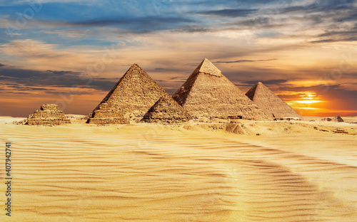 Pyramids of Egypt at sunset, famous Wonder of the World, Giza
