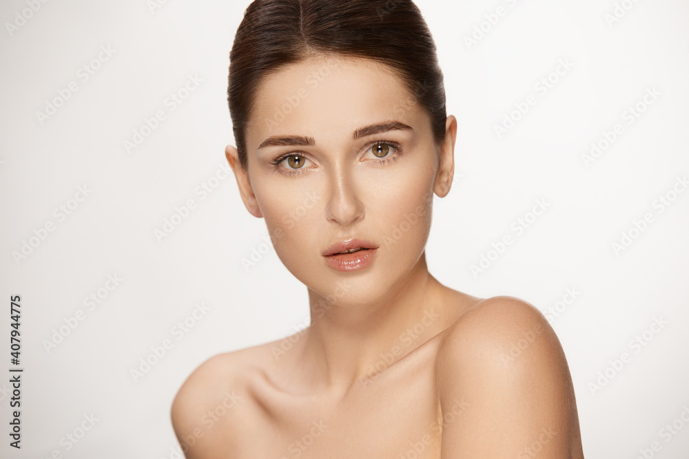 stunning woman with perfect skin and tied brown hair stunning woman with perfect skin and tied brown hair