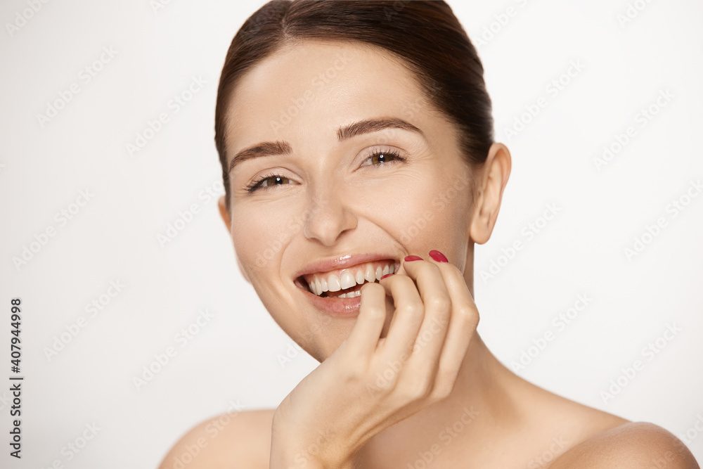 young happy woman smiling isolated on white young happy woman smiling isolated on white