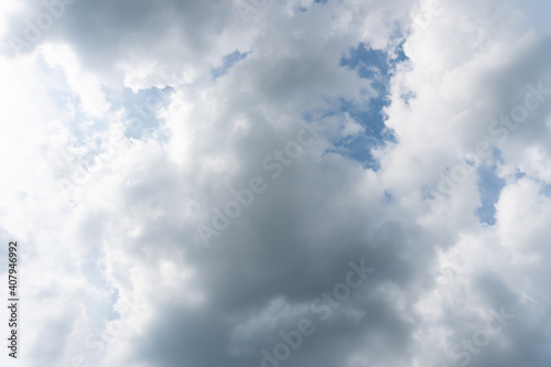 Blue sky background with clouds © Anthony Paz