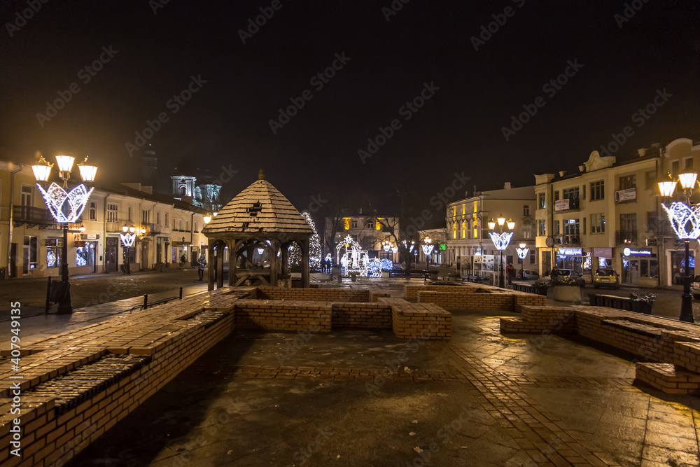 Chelm, Poland, January 9, 2021: View of the city streets in the evening in the winter period after Christmas.