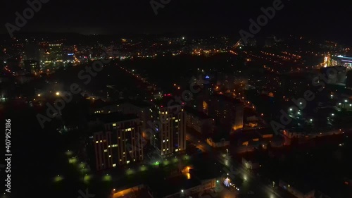 Wallpaper Mural Flight over the night city and the house that glows at night. View of the house at night. The camera flies up to the house. Torontodigital.ca