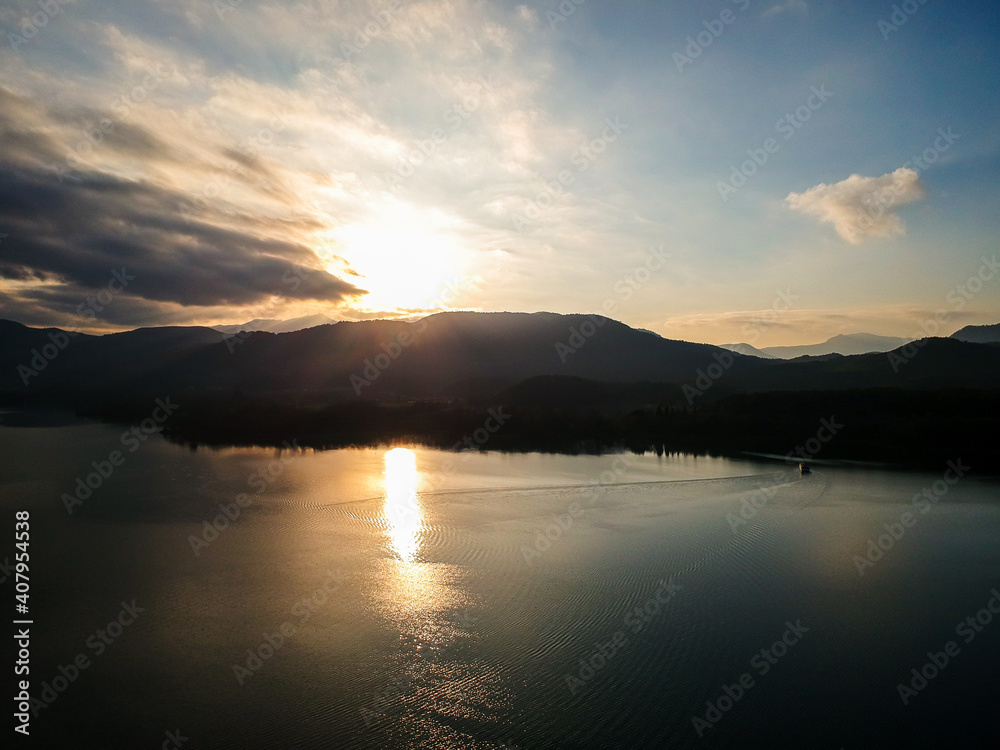 Sunset over Lake Banyoles. Moments of relaxation in winter.