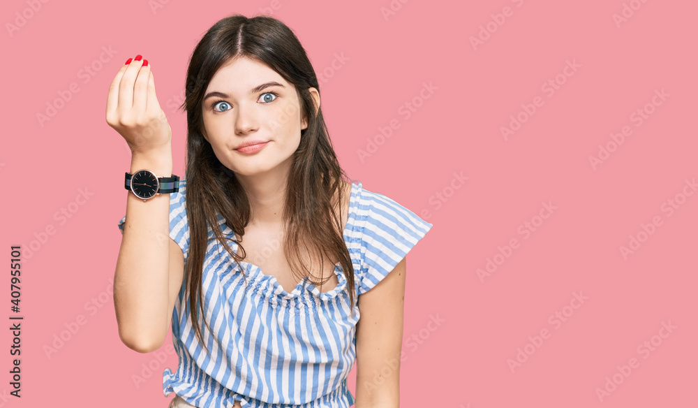 Young beautiful caucasian girl wearing casual clothes doing italian gesture with hand and fingers confident expression Young beautiful caucasian girl wearing casual clothes doing italian gesture with hand and fingers confident expression