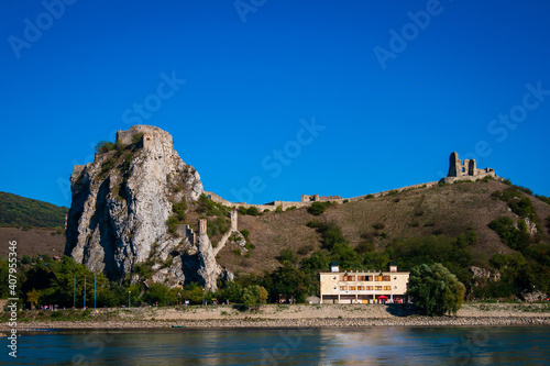 Photography View of the famous Devin Castle on a hill  in Bratislava, Slovakia under a clear