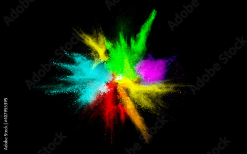 Colored powder explosion isolated on black background.