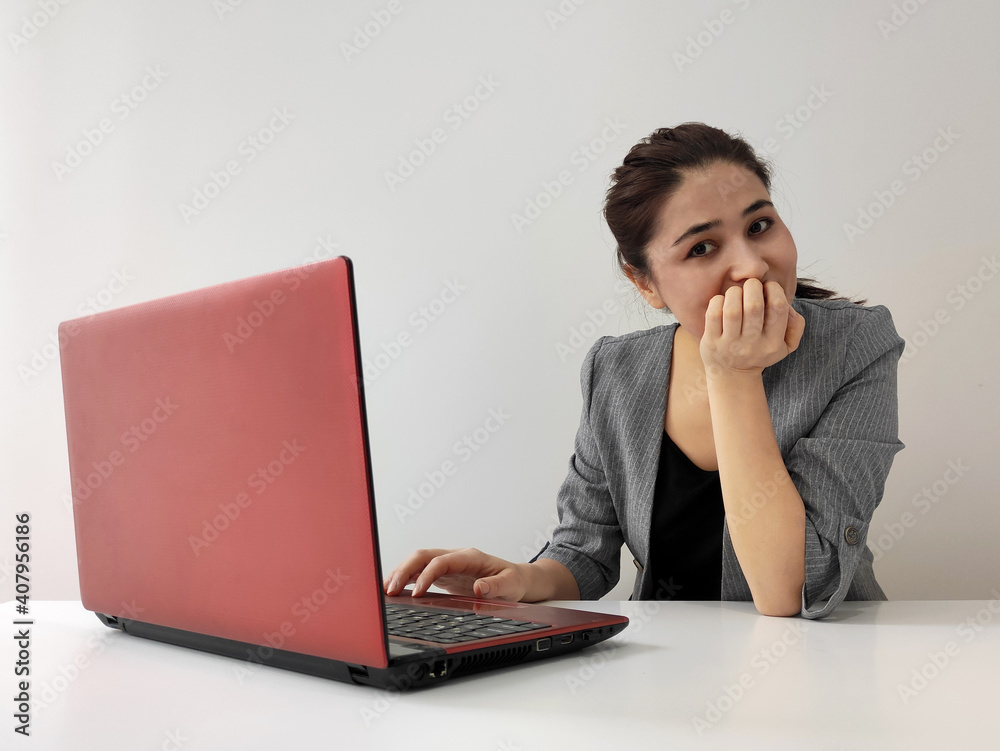 Young businesswoman working on laptop Young businesswoman working on laptop