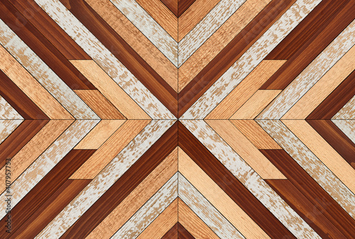 Colorful wooden wall with chevron pattern made of narrow hardwood planks. Wood texture background.