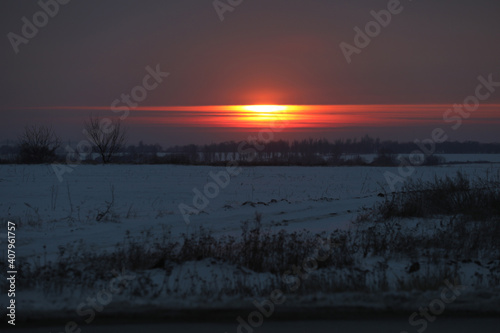 sunset over the field © Haletska Olha