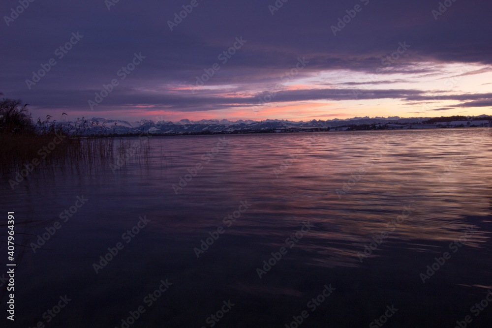 Colorful sunset over the lake of pfaeffikon (Pfäffikersee)