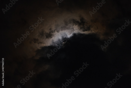 Obraz na płótnie The moon among the stars and clouds w salonie