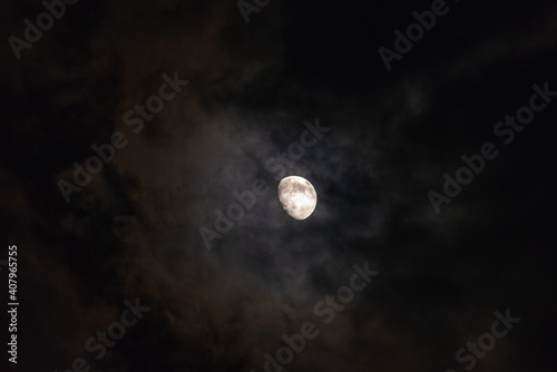 Obraz na płótnie The moon among the stars and clouds w salonie