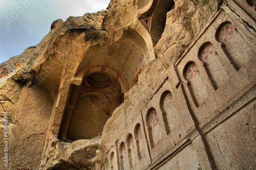 Valley of Goreme, in Cappadocia (Central Anatolia, Turkey). Ancient rock-cut Christian Byzantine churches. Fairy Chimneys photo