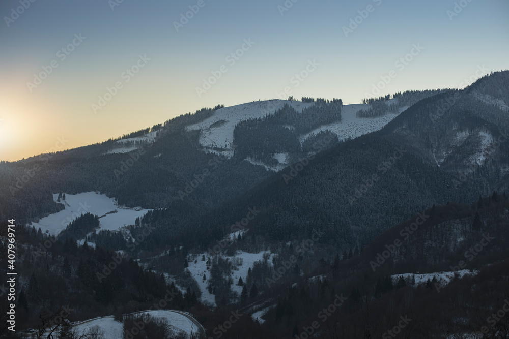Snow covered mountains.Winter landscape during the evening.