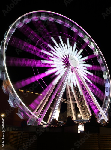 ferris wheel in motion  at night