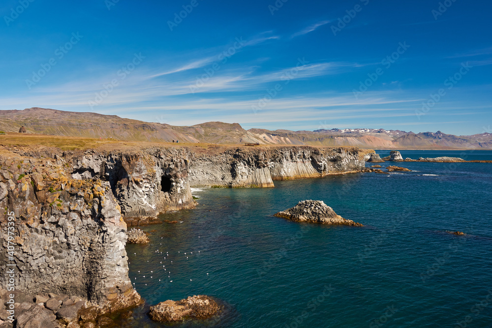 Rocks overlooking the sea in the Snaefellsnes peninsula in western Iceland, near the village of Arnarstapi, Iceland Rocks overlooking the sea in the Snaefellsnes peninsula in western Iceland, near the village of Arnarstapi, Iceland