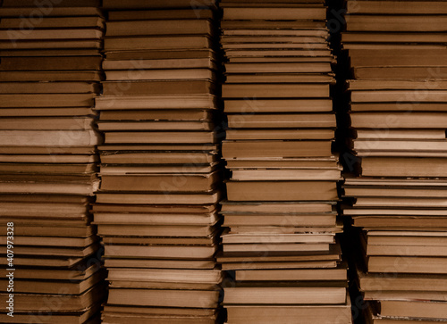 Four stacks of old books. Vintage background.