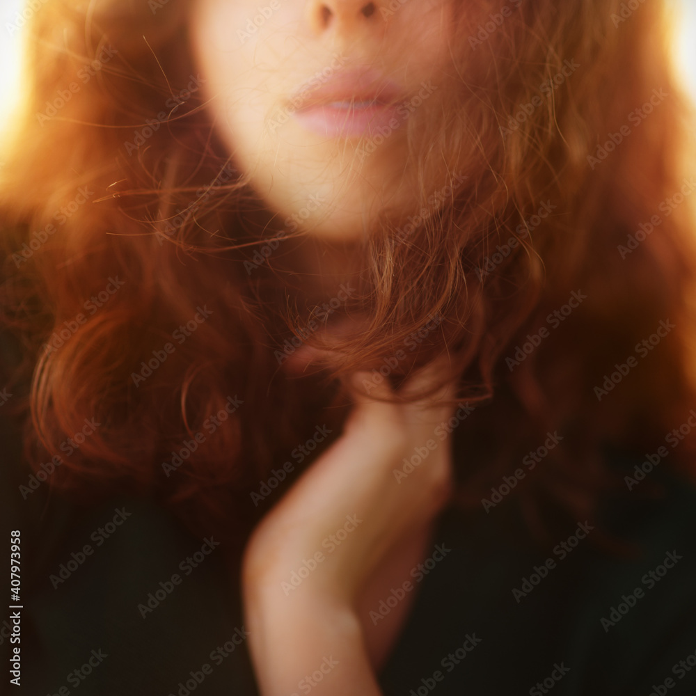 Young caucasian woman with brown hair resting in autumnal park. Close-up head and shoulders. Young caucasian woman with brown hair resting in autumnal park. Close-up head and shoulders.