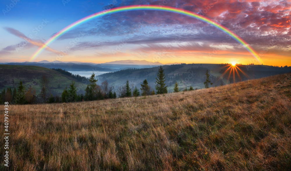 Rainbow over the Mountains. autumn morning in the Carpathians
