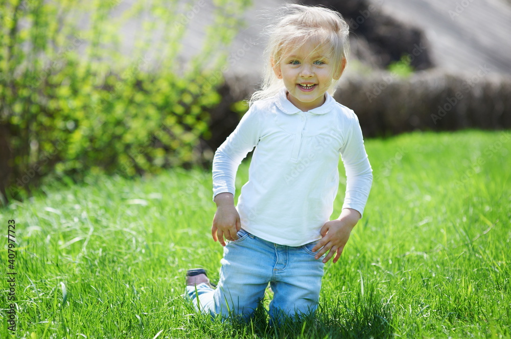 Little child girl playing in the spring forest. Little child girl playing in the spring forest.