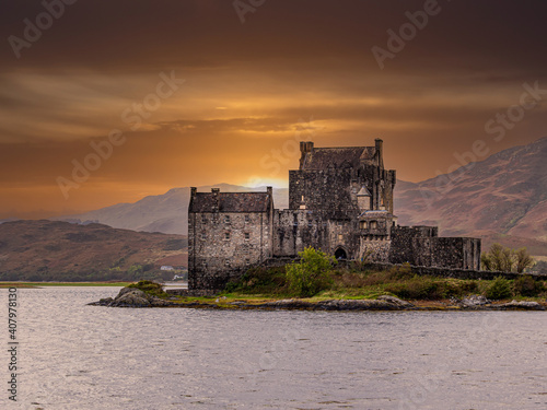 Eiiean Donan Castle, Scotland. Eilean Donan castle is situated on a small tidal island where three sea lochs meet, Loch Duich, Loch Long and Loch Alsh, in the western Highlands of Scotland.