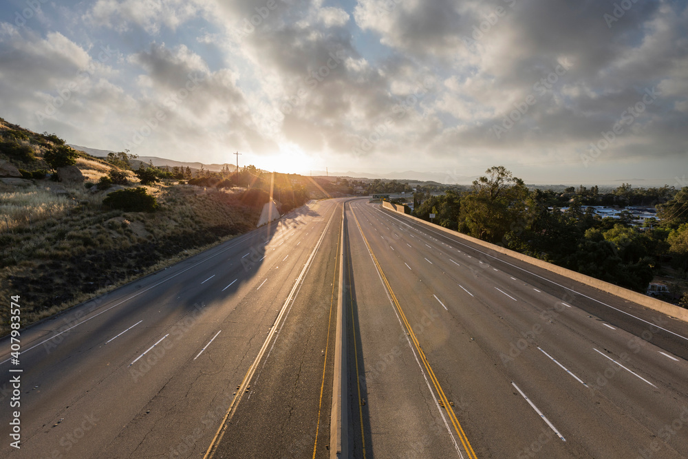 Empty ten lane route 118 freeway with cloudy sky in the Chatsworth area of Los Angeles, California.