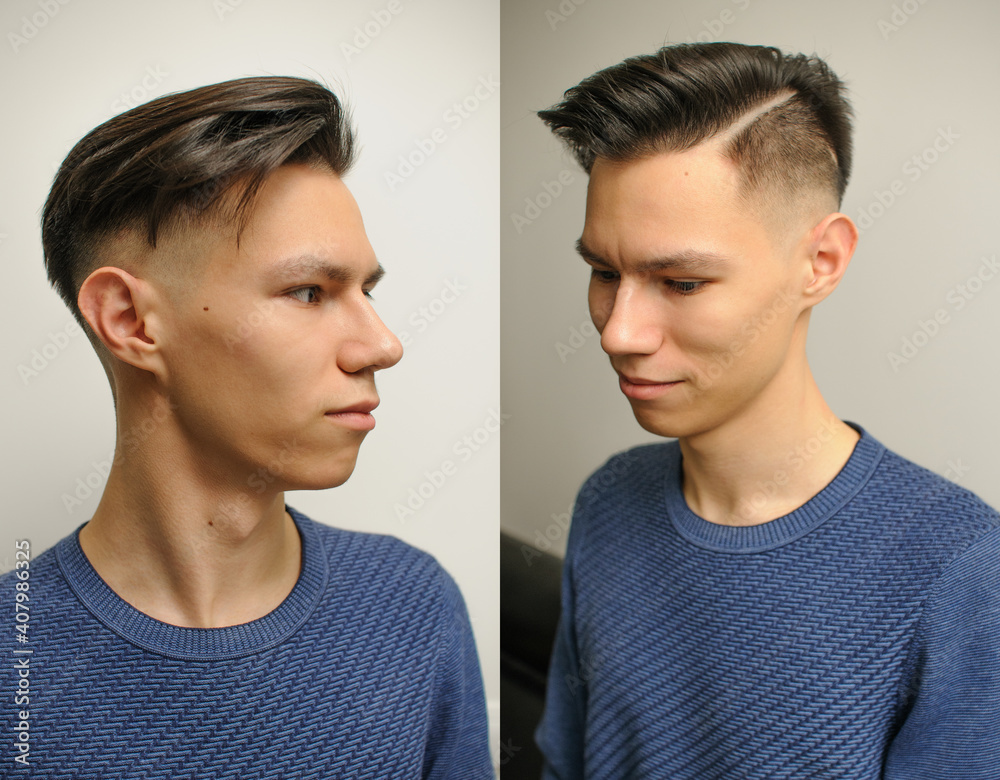 Fototapeta premium Young man with modern short haircut in beauty salon