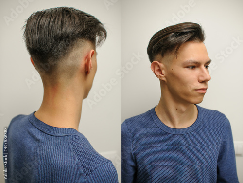 Young man with modern short haircut in beauty salon