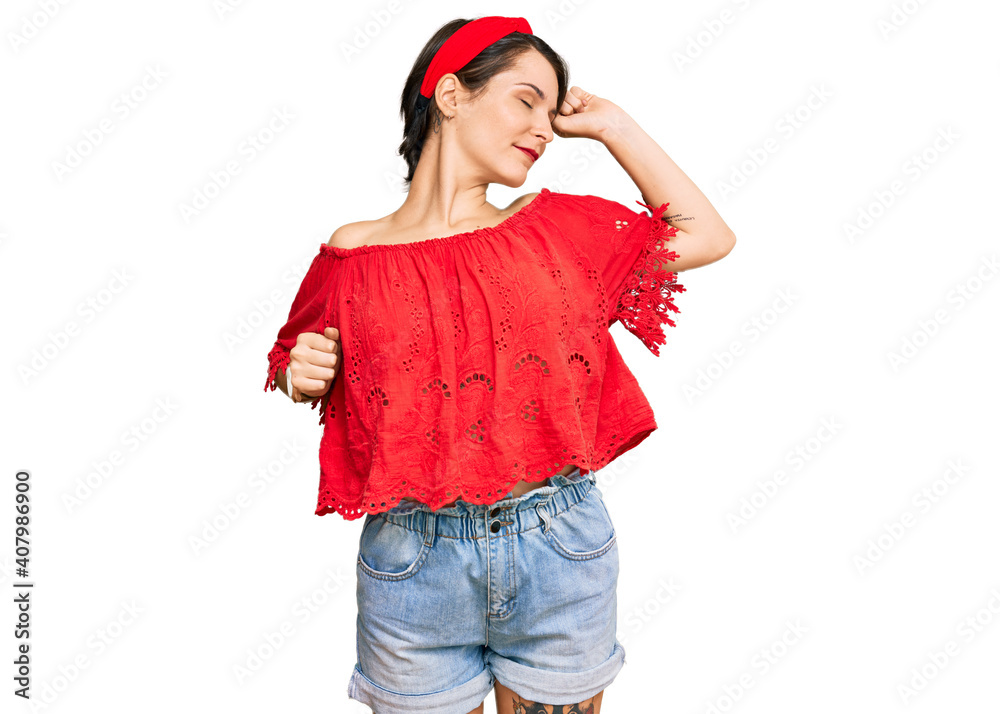 Young brunette woman with short hair wearing casual summer clothes and diadem stretching back, tired and relaxed, sleepy and yawning for early morning Young brunette woman with short hair wearing casual summer clothes and diadem stretching back, tired and relaxed, sleepy and yawning for early morning