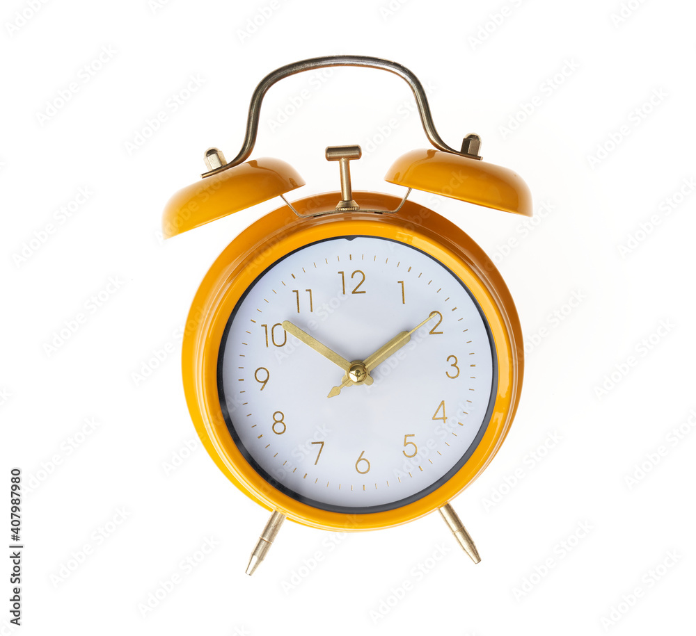 Hand of hispanic man holding yellow alarm clock over isolated white background. Hand of hispanic man holding yellow alarm clock over isolated white background.