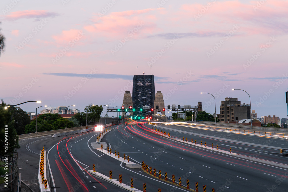 Sunset traffic going into Sydney Harbour Bridge.
