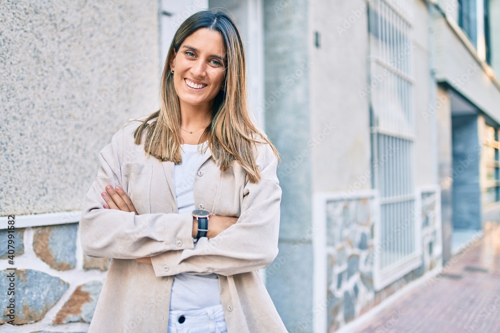 Young caucasian woman smiling happy walking at the city.