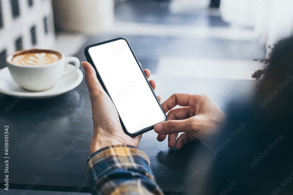cell phone blank white screen mockup.woman hand holding texting using mobile on desk at office.background empty space for advertise.work people contact marketing business,technology cell phone blank white screen mockup.woman hand holding texting using mobile on desk at office.background empty space for advertise.work people contact marketing business,technology
