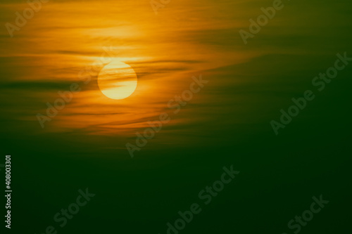Sunrise  gorgeous summer sun landscape  picturesque strong dawn with a cloud in the orange sky.